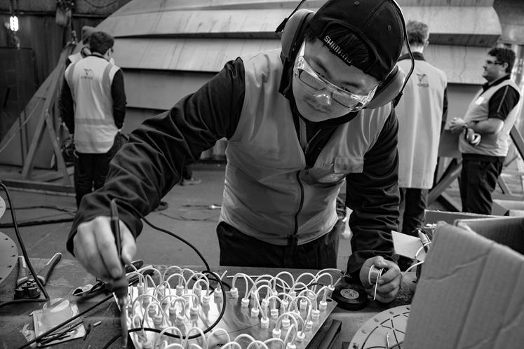 A Wintec trades student working on Tōia Mai in the Longveld workshop. Photo Yin Wang.
