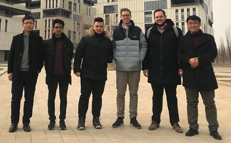 Four Wintec business students Hanjun Nakauchi (second from left), Chanatip Chatchawalit, Jack Hawker and Andy Murray with their Chinese supervisors during their internship for a major commerce website firm.