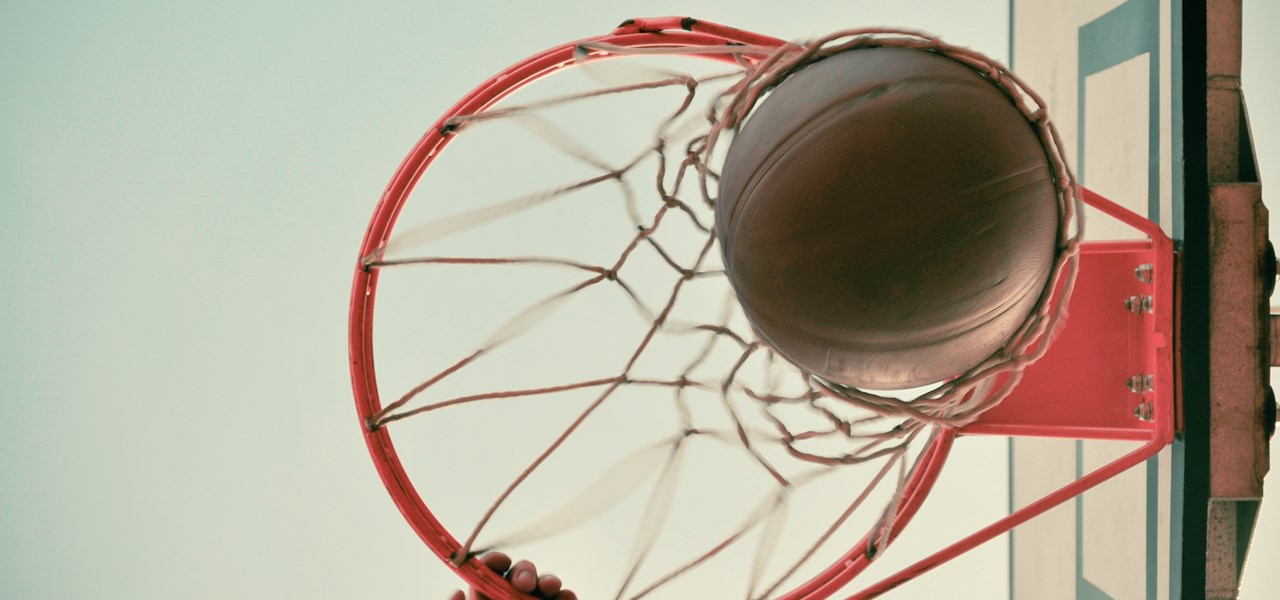 Basketball falling into hoop