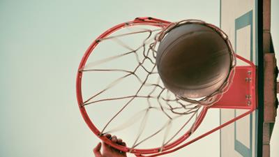 Basketball falling into hoop