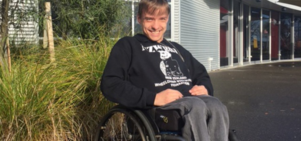 Callum Bridson seated outside Wintec's Centre for Sport Science and Human Performance