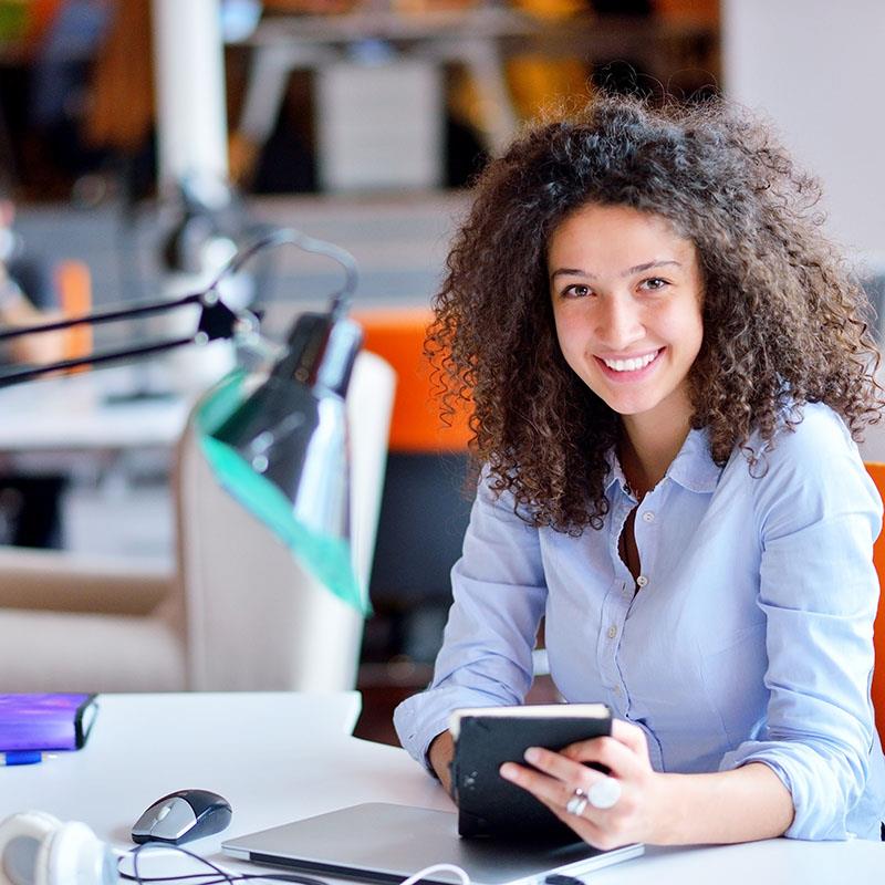 woman working at desk in office