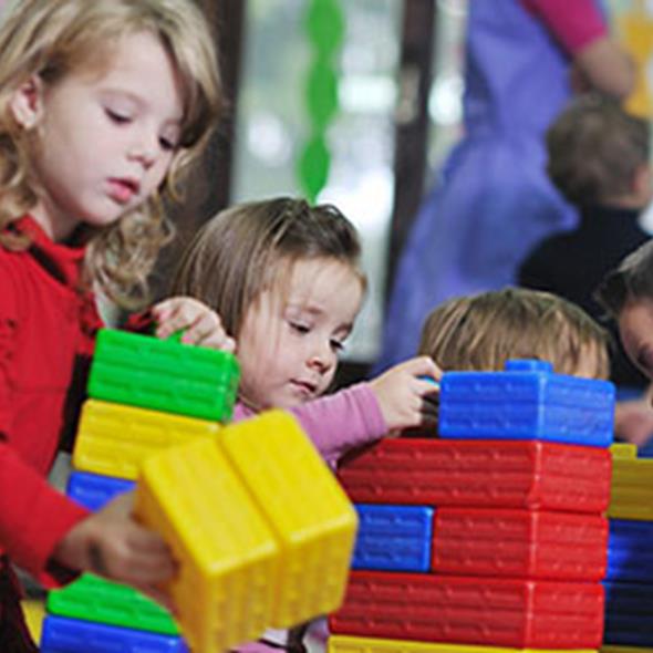 children playing with block toys