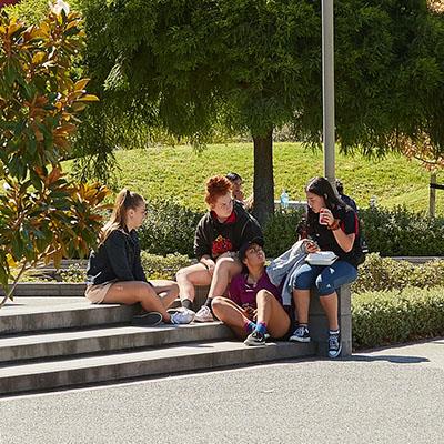 Students seated outside Rotokauri Campus hub