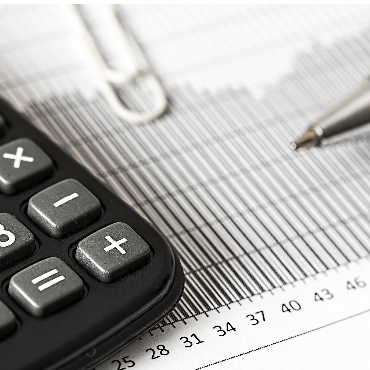 Calculator and finance paperwork