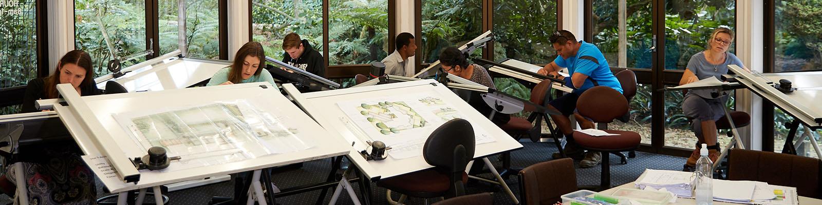 Landscape design students working in design studio