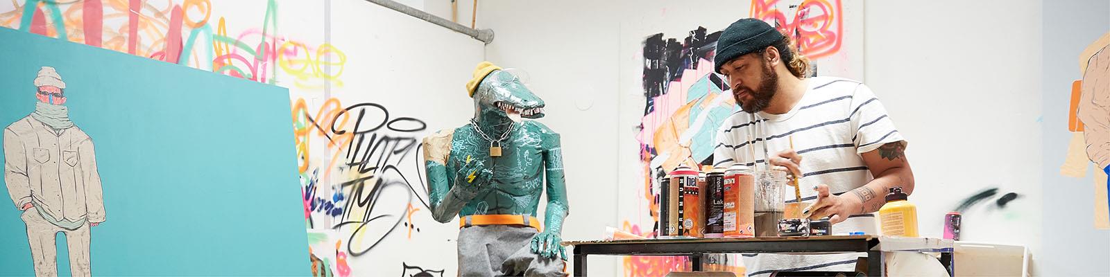 Contemporary art student working in studio